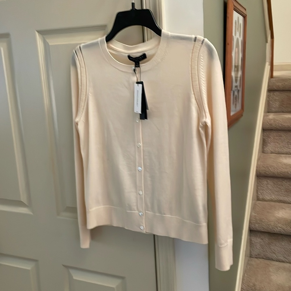 Crème colored button sweater.